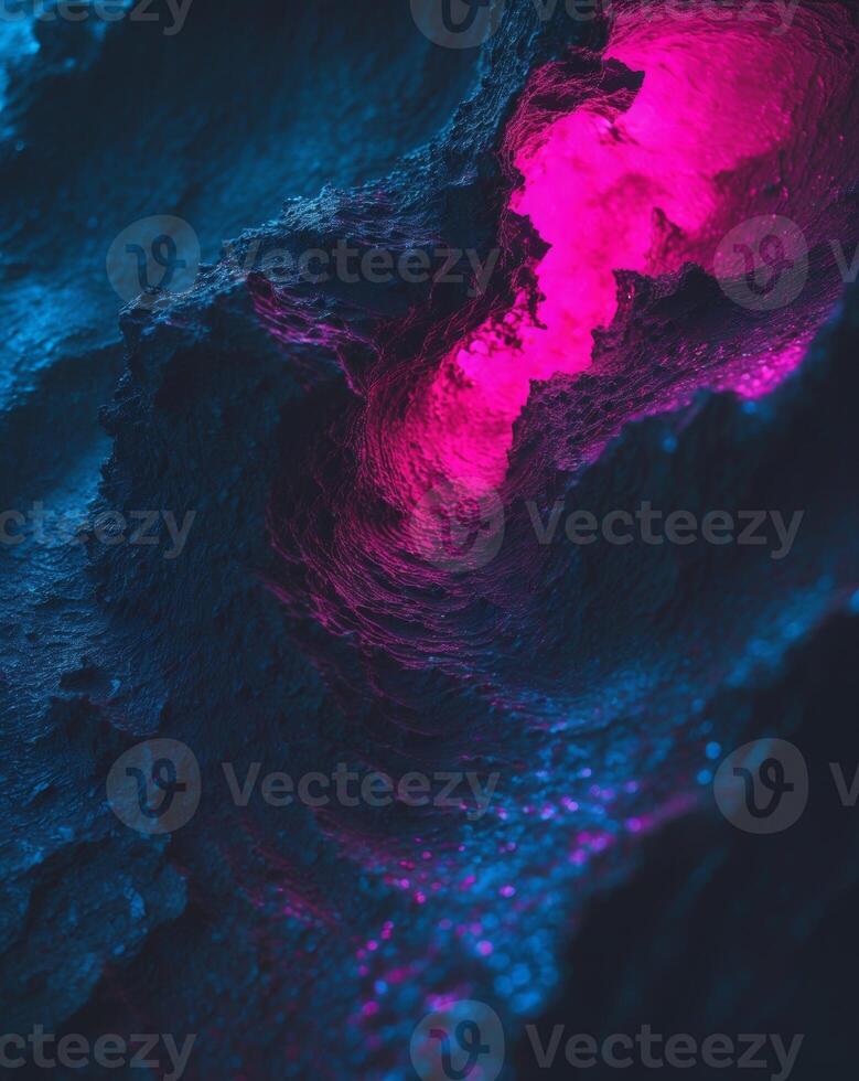 A close up of a pink light coming out of a rock photo