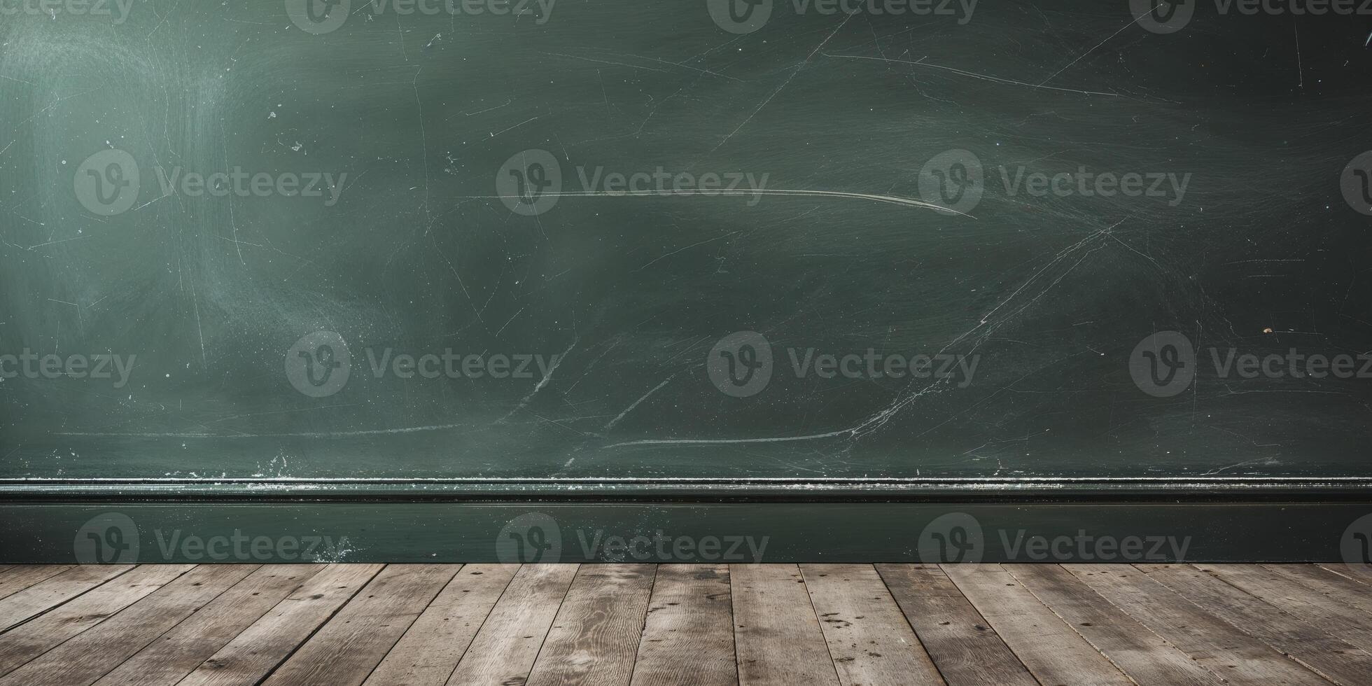 An empty room with a chalkboard and wooden floor photo