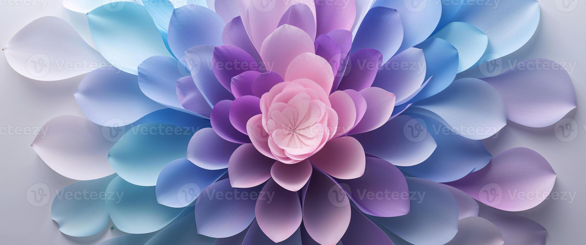 Colorful gradient petals arranged radially creating an abstract floral design with shades of blue purple and pink providing a soft aesthetic photo