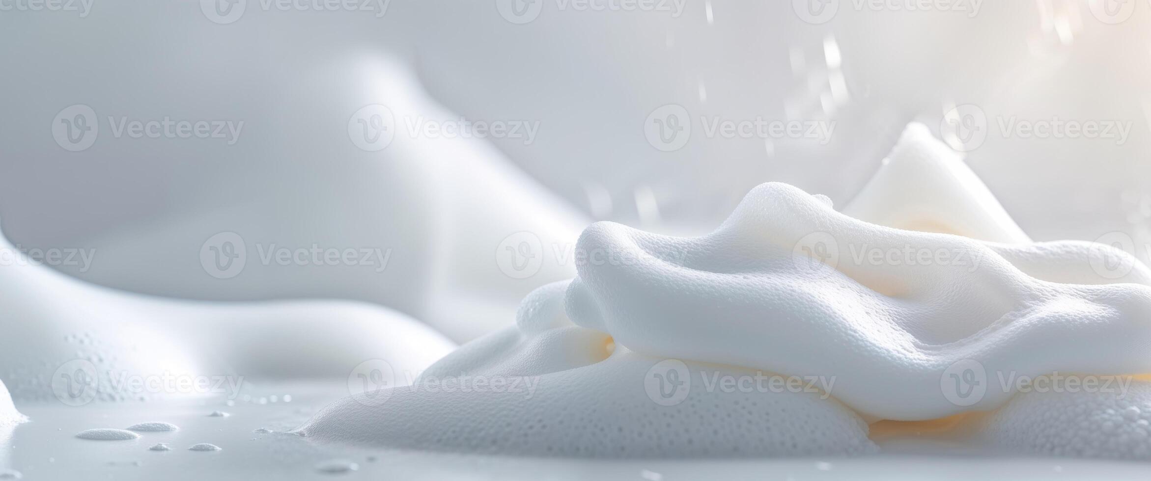 A close up of a white liquid being poured into a bowl photo