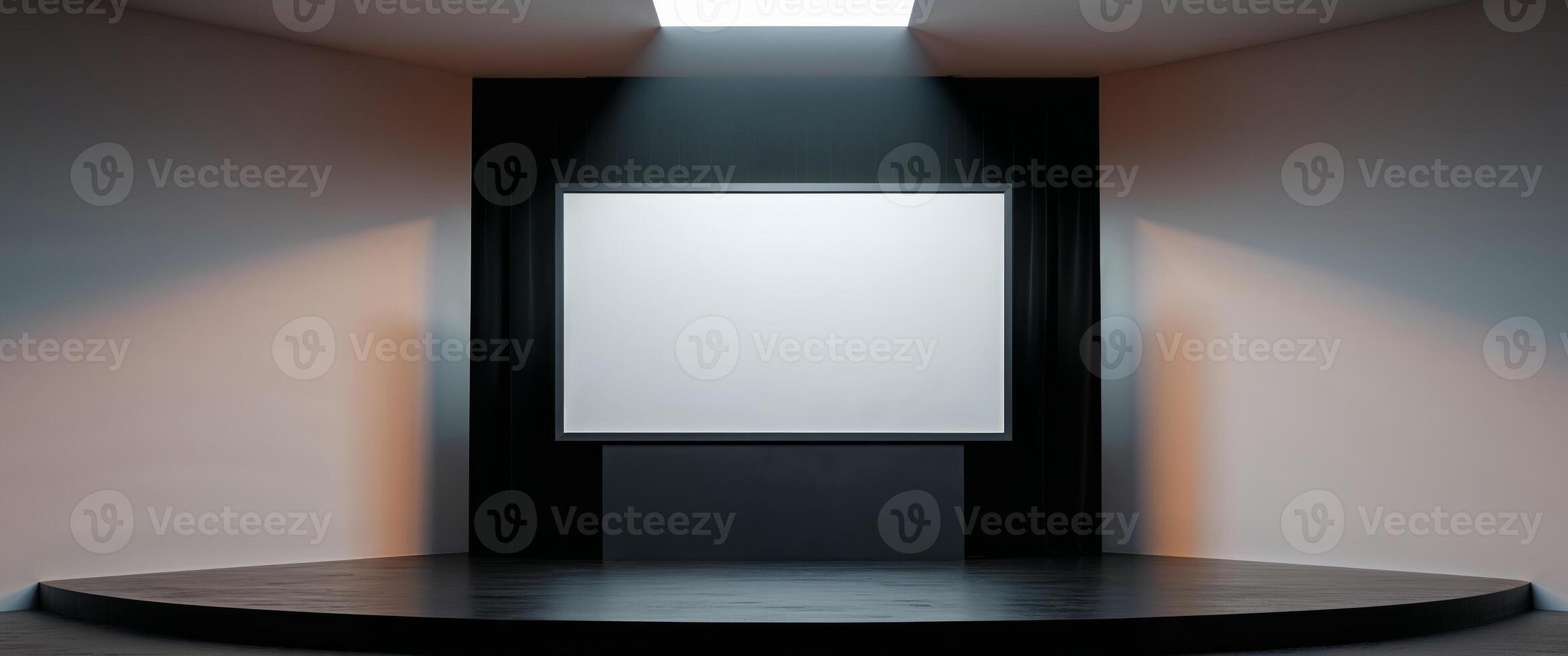 An empty room with a white screen on a pedestal photo