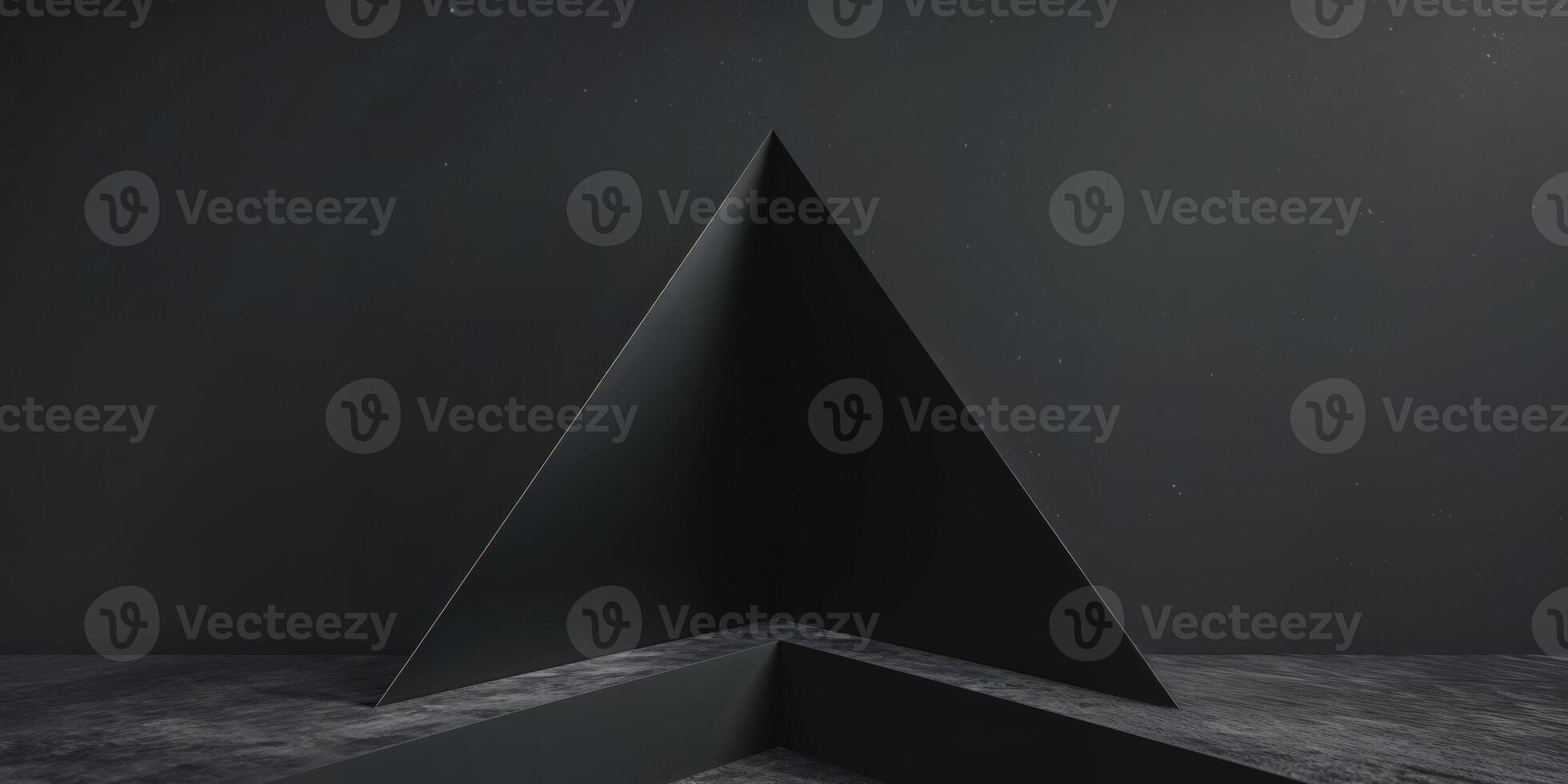 A black triangle with a dark floor and a wall photo