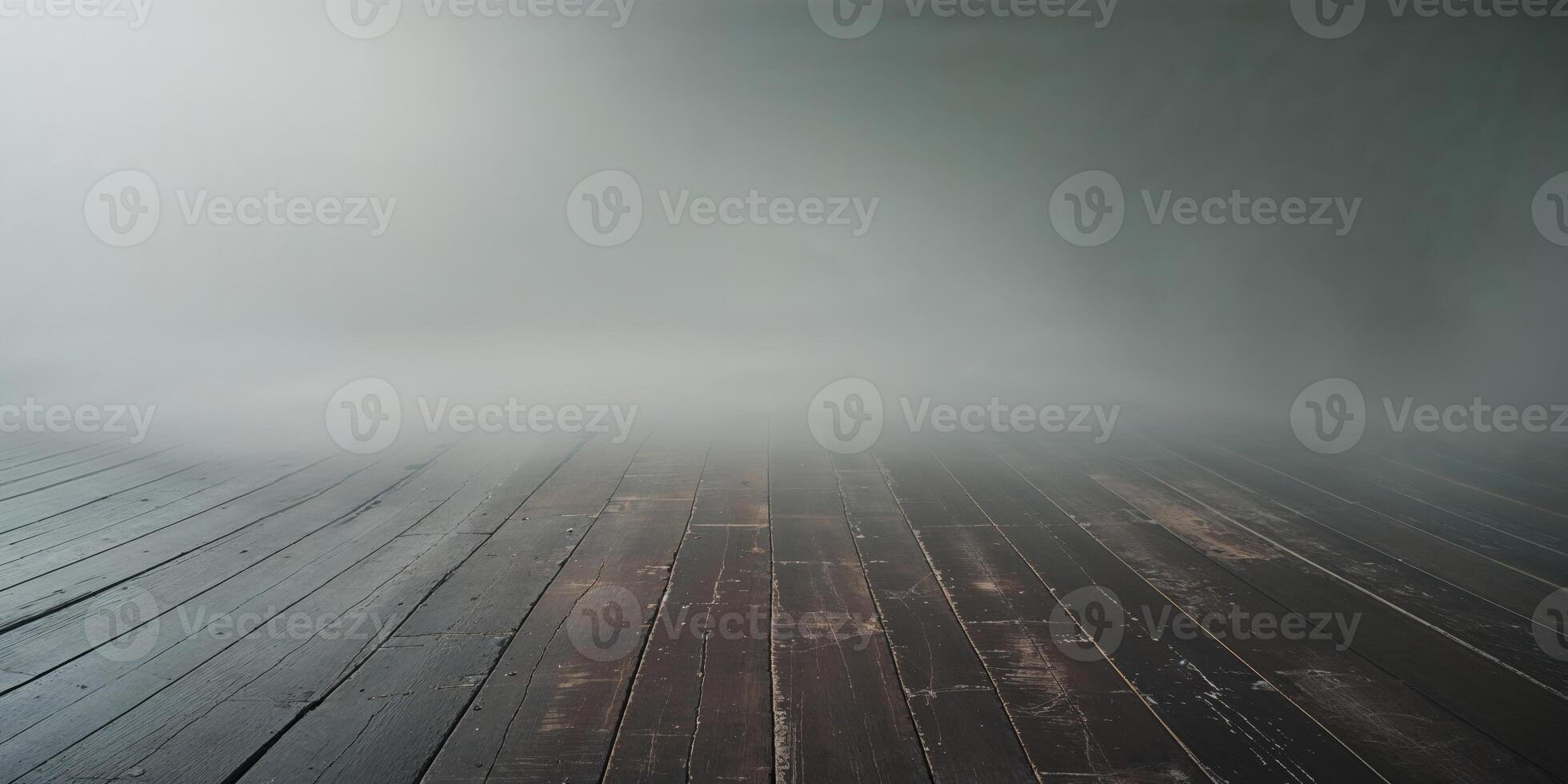 An empty room with a wooden floor and fog photo