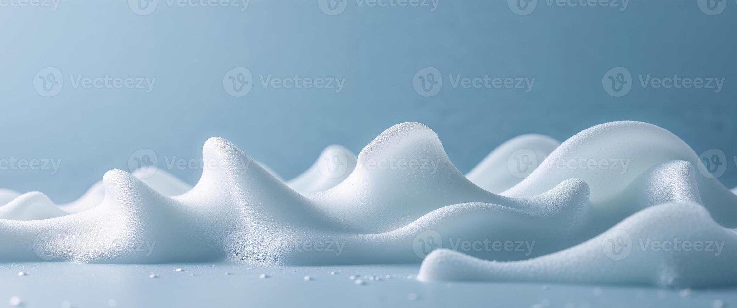 Soft white foam texture on light blue background for creative design. photo