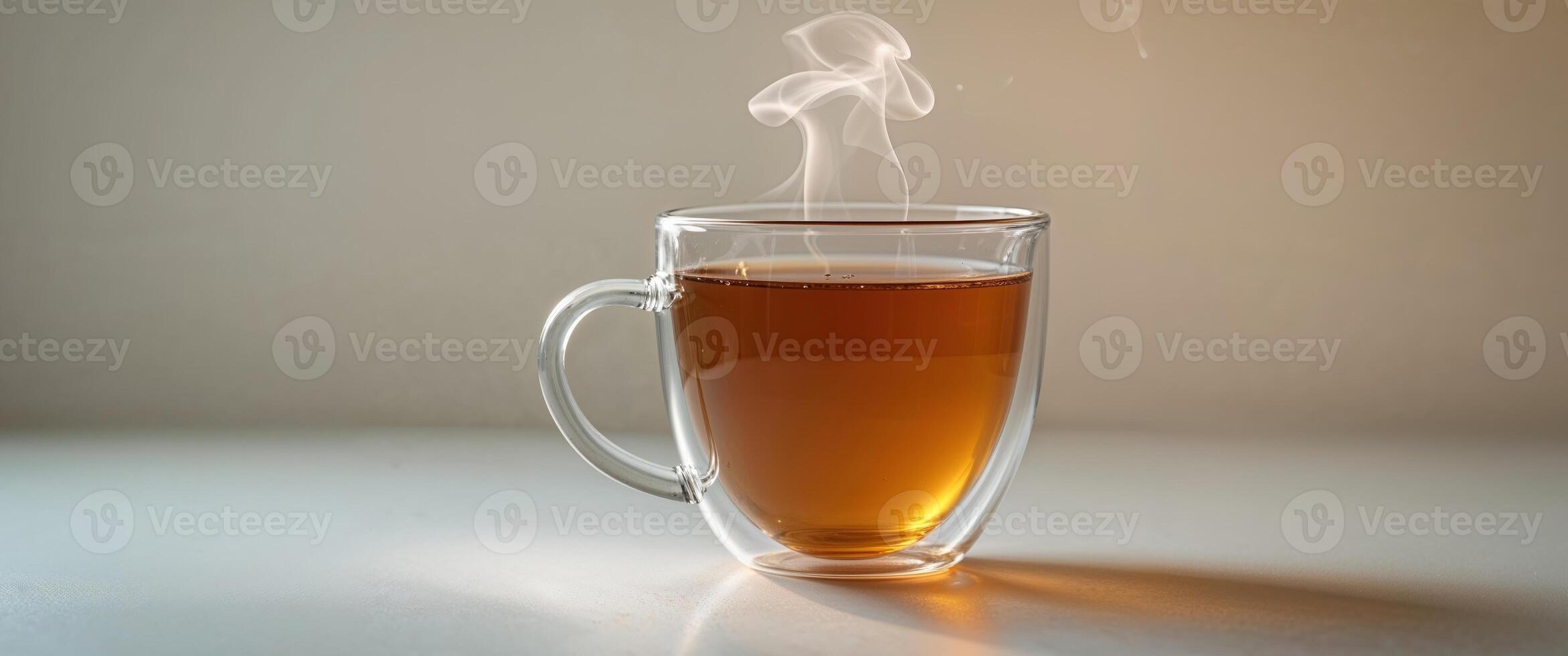 Warm Ginger Cinnamon Tea in Glass Mug Close up Aromatic Beverage Hot Drink. photo
