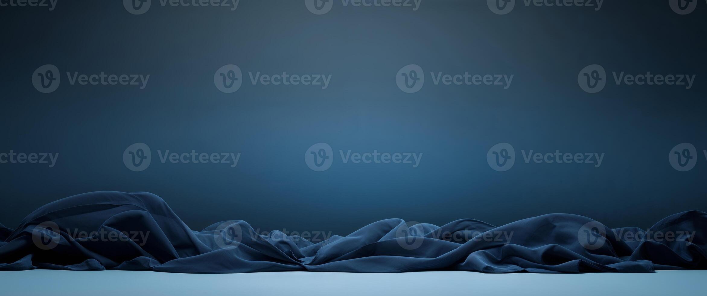 Mysterious dark blue light background for atmospheric design and digital art photo