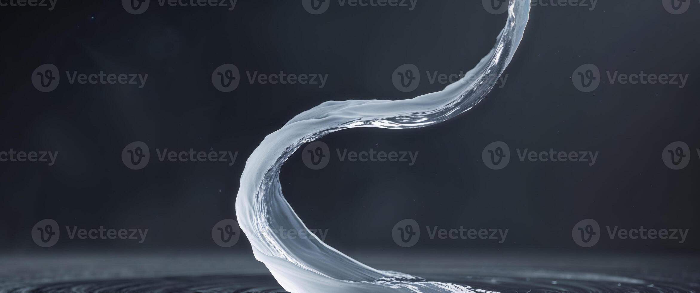 A white liquid flowing into a circular shape photo