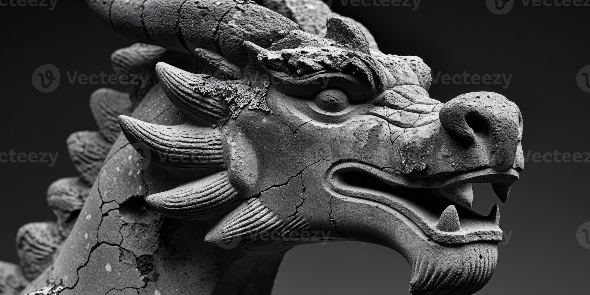 A statue of a dragon head with a stone face photo