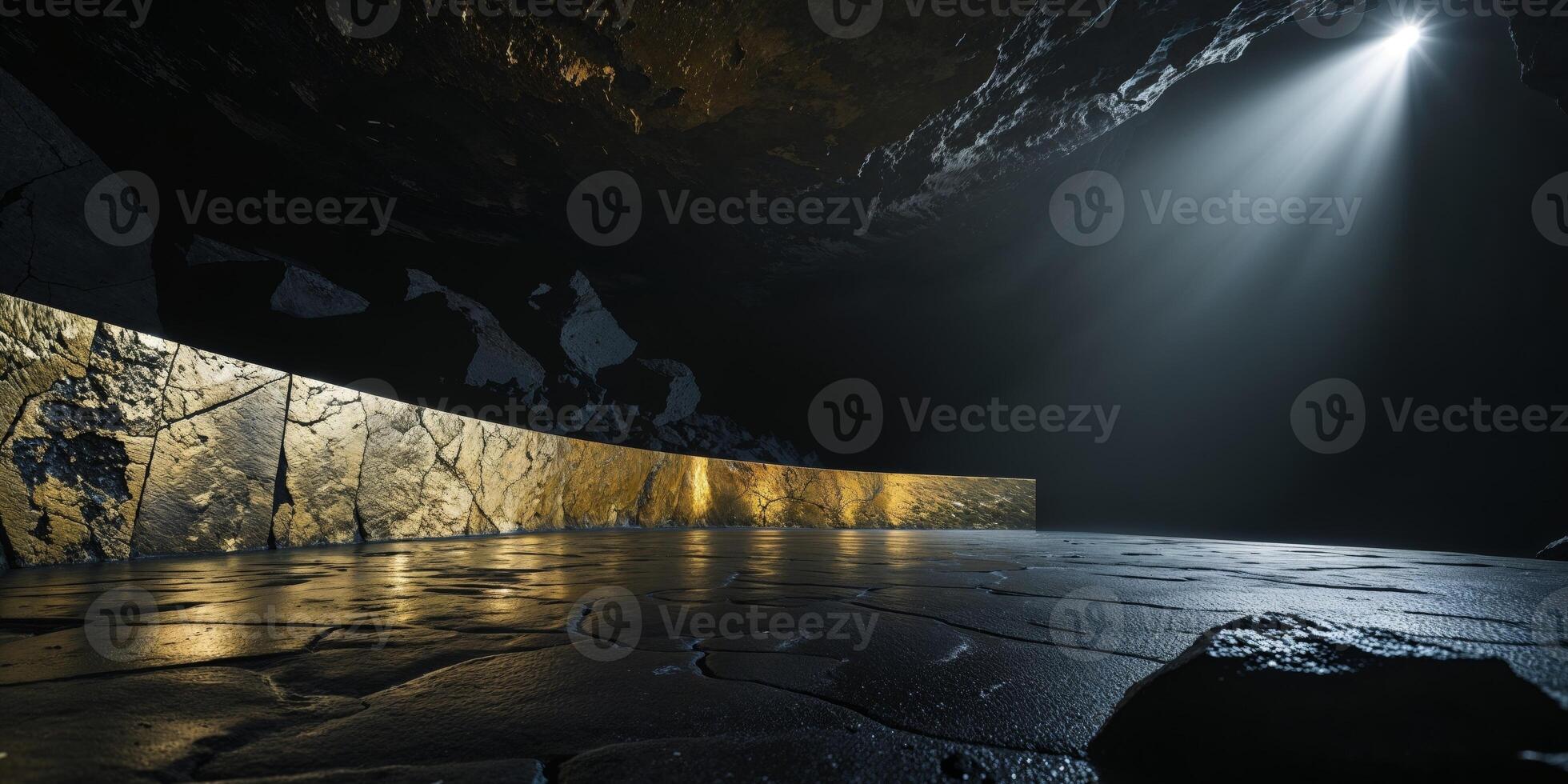 A dark cave with a golden wall and a light shining through photo