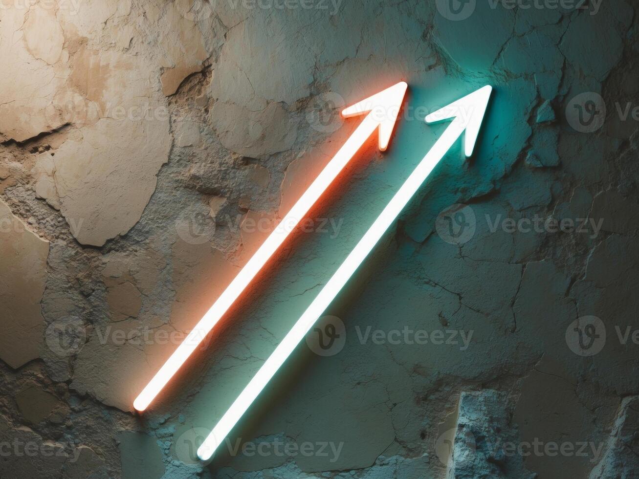 Two neon arrows pointing in opposite directions on a wall photo