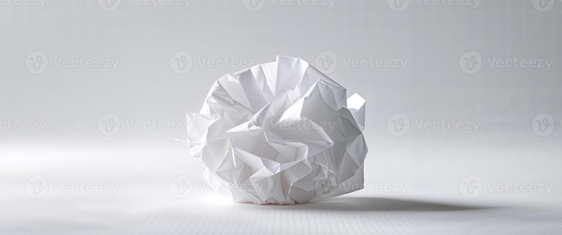 a piece of white paper crumpled with a delicate grid overlay. photo