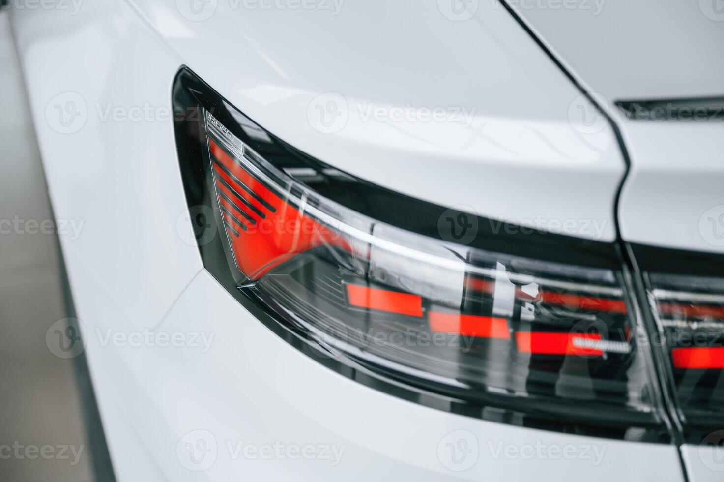 Close up view of ,the rear part of the modern white car photo