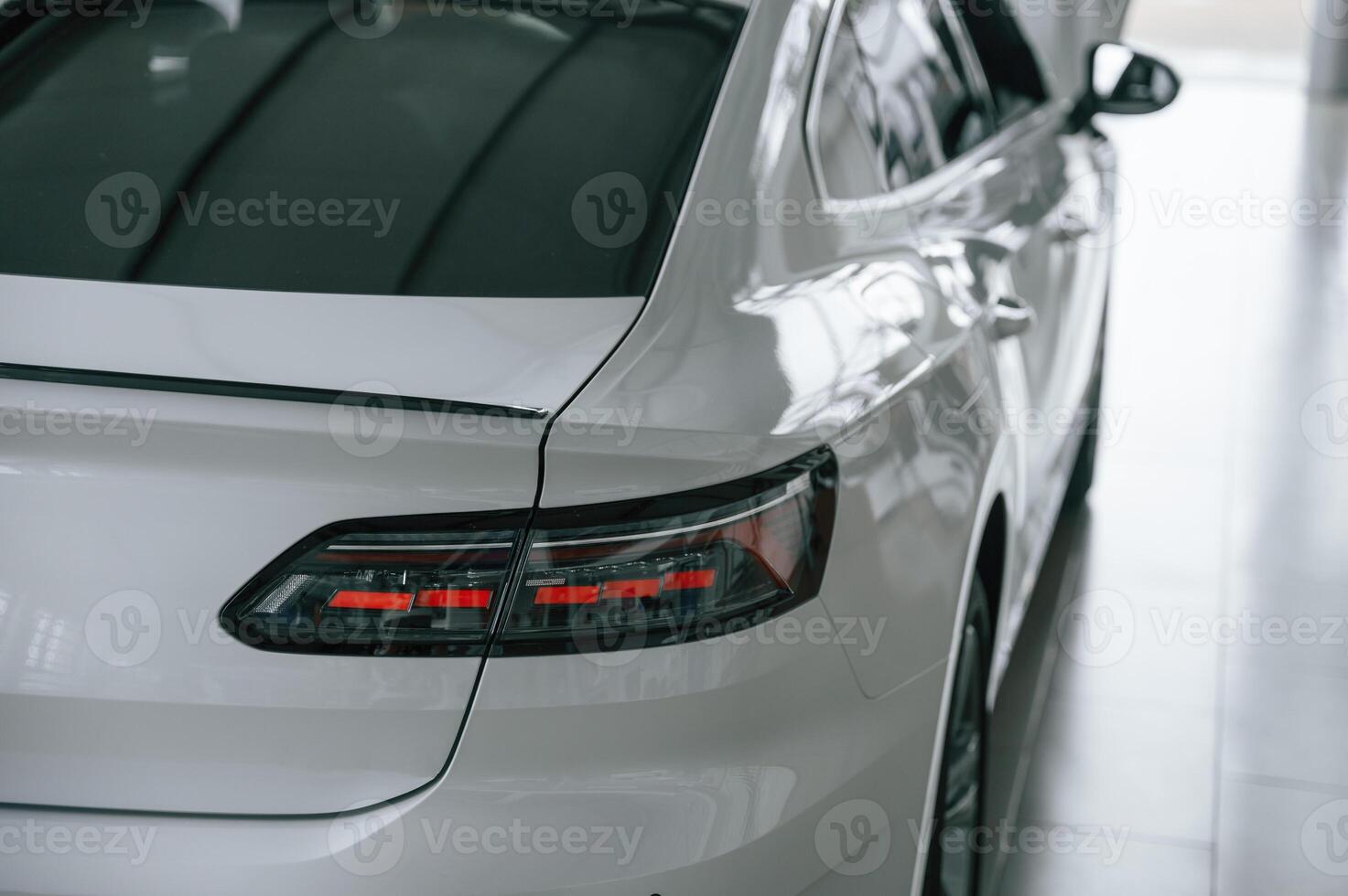 Close up ,view, of the rear part of the modern white car photo
