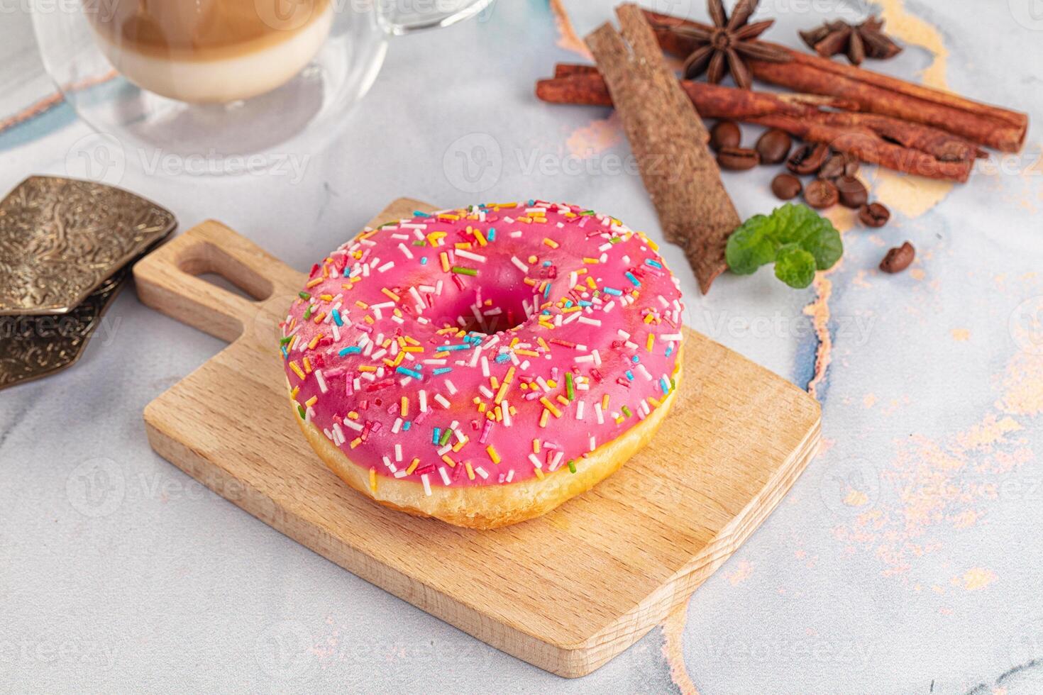 A donut with sprinkles on it photo