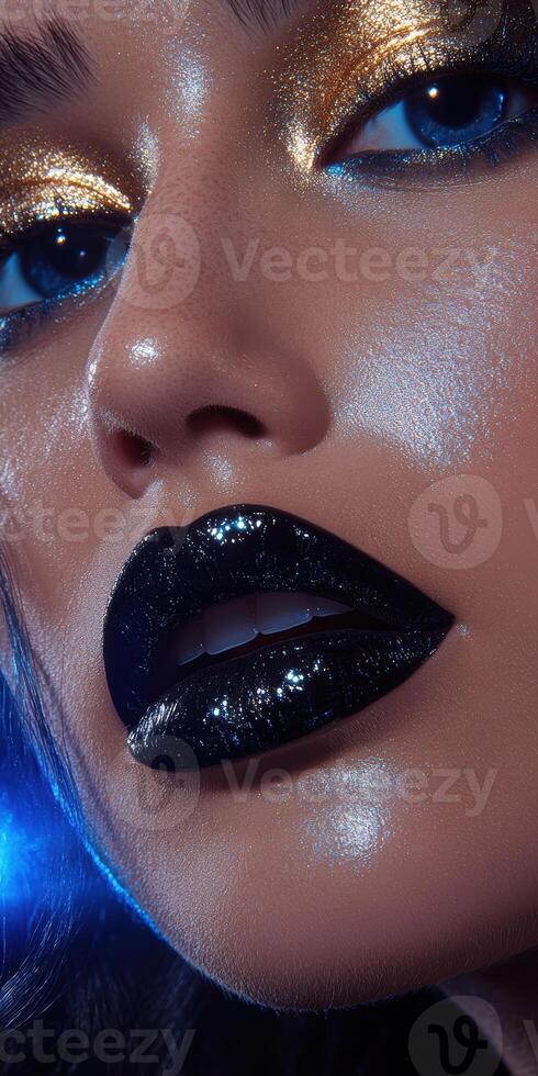 Close up of glossy black lips and glittering gold eyeshadow on a model, capturing a bold and glamorous beauty look photo