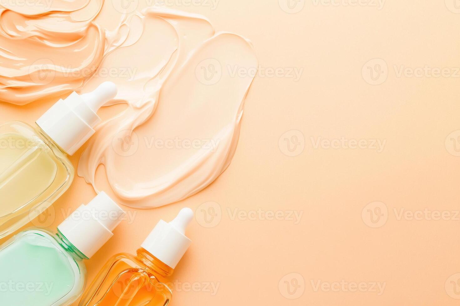 Assorted serums with dropper bottles on peach background featuring texture swatches in skincare and beauty arrangement photo