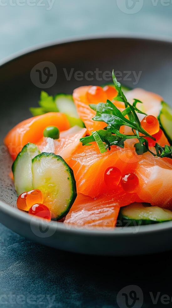 Fresh salmon sashimi with cucumber and roe garnish in a black bowl, highlighting japanese cuisine and culinary art, photo