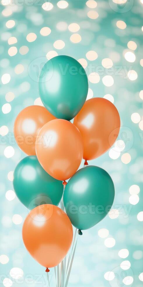 Vibrant teal and orange balloons against sparkling bokeh background, photo