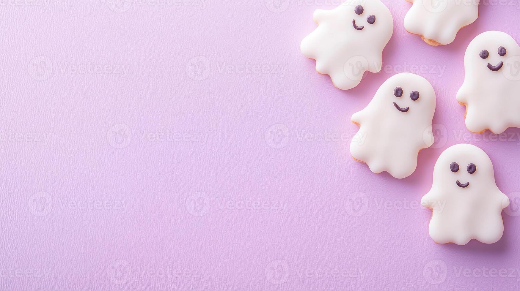 Happy ghost shaped cookies on pastel background celebrating a playful halloween theme, photo