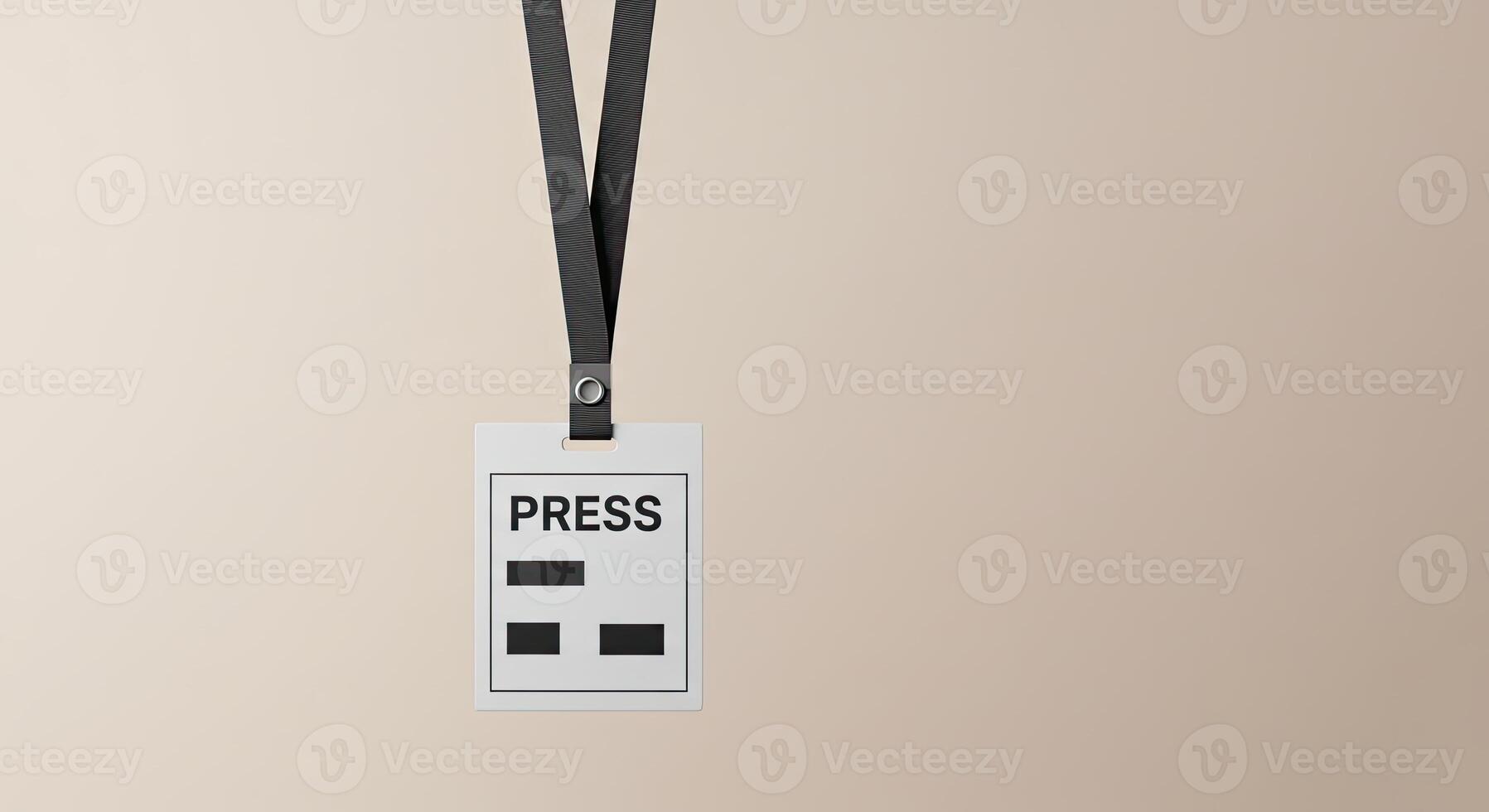 A white and black press badge hanging from a lanyard photo