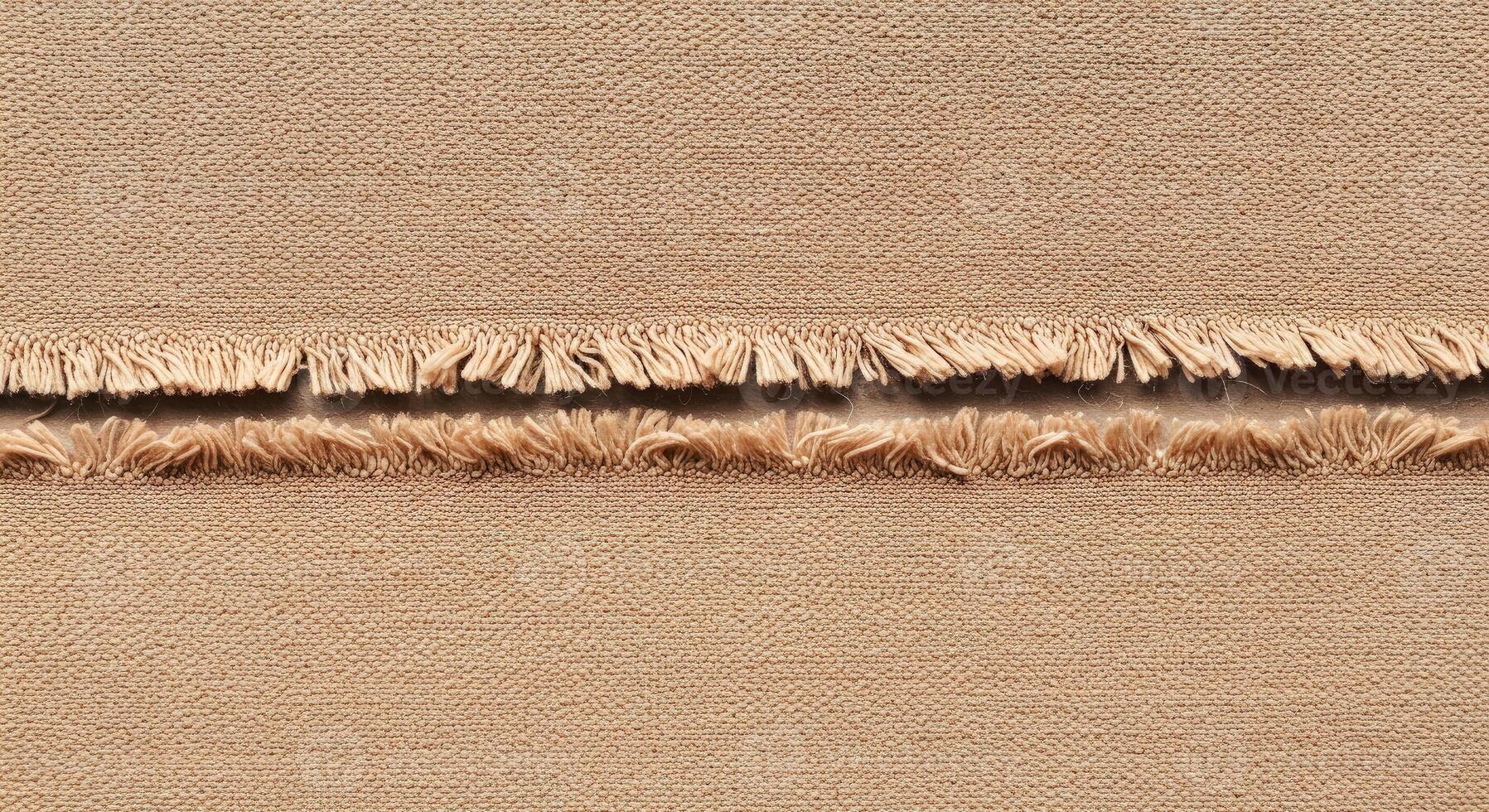 A piece of fabric with fringes on it photo