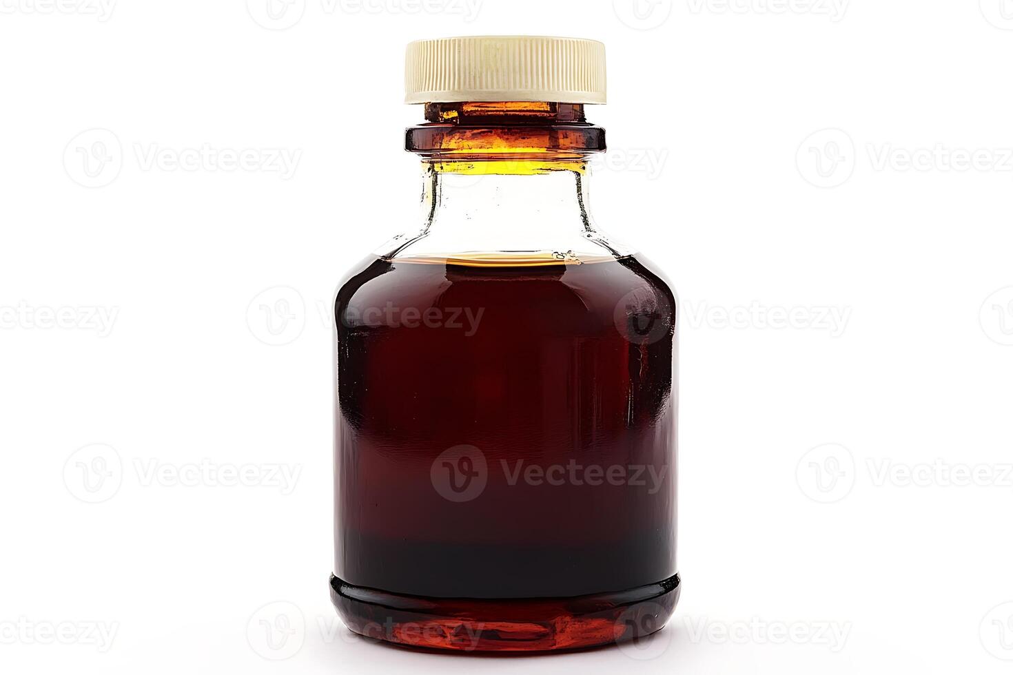 A bottle of syrup with a wooden lid photo