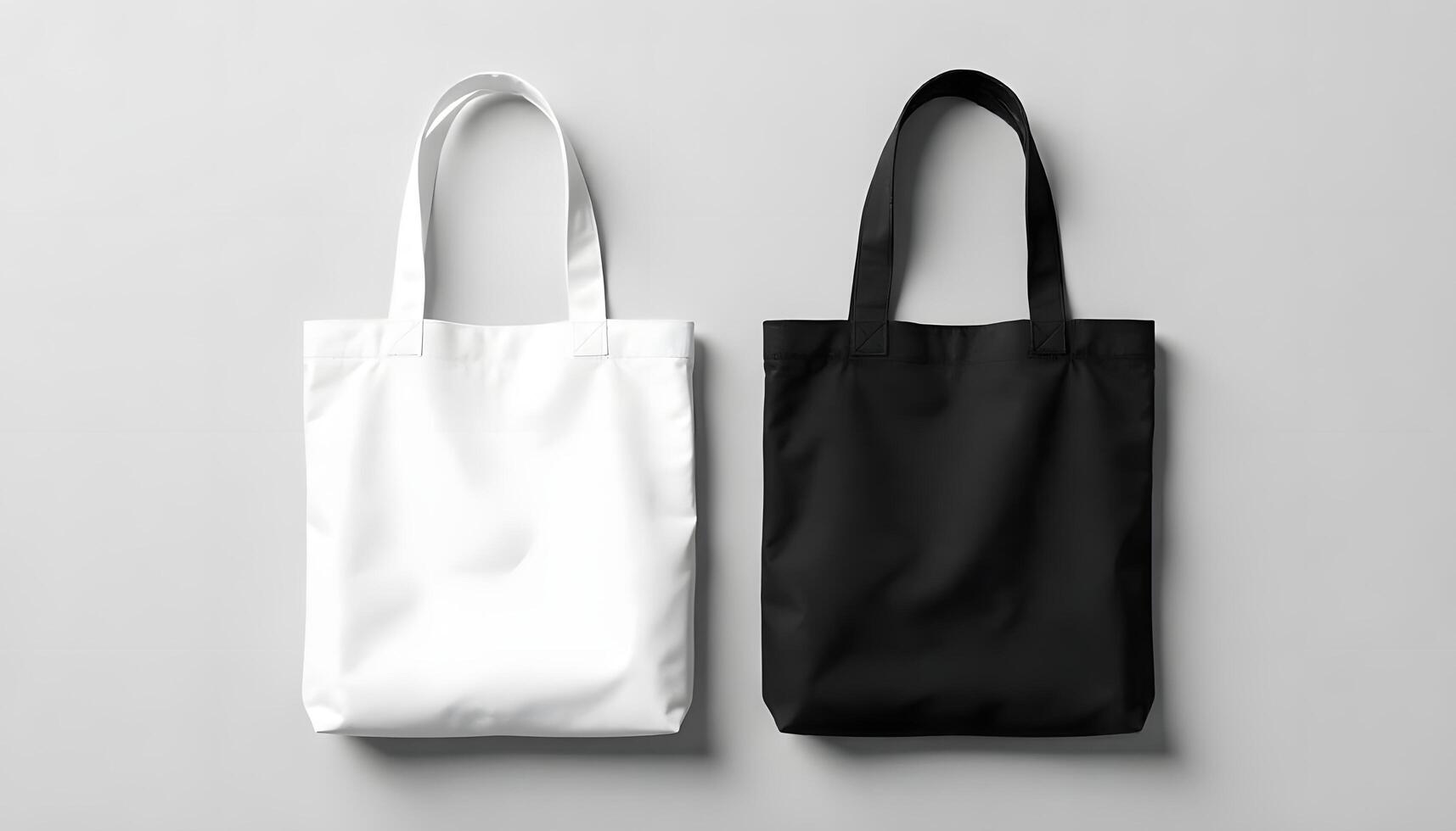 White and Black Tote Bags for your visual brand mockup on a Gray Background photo