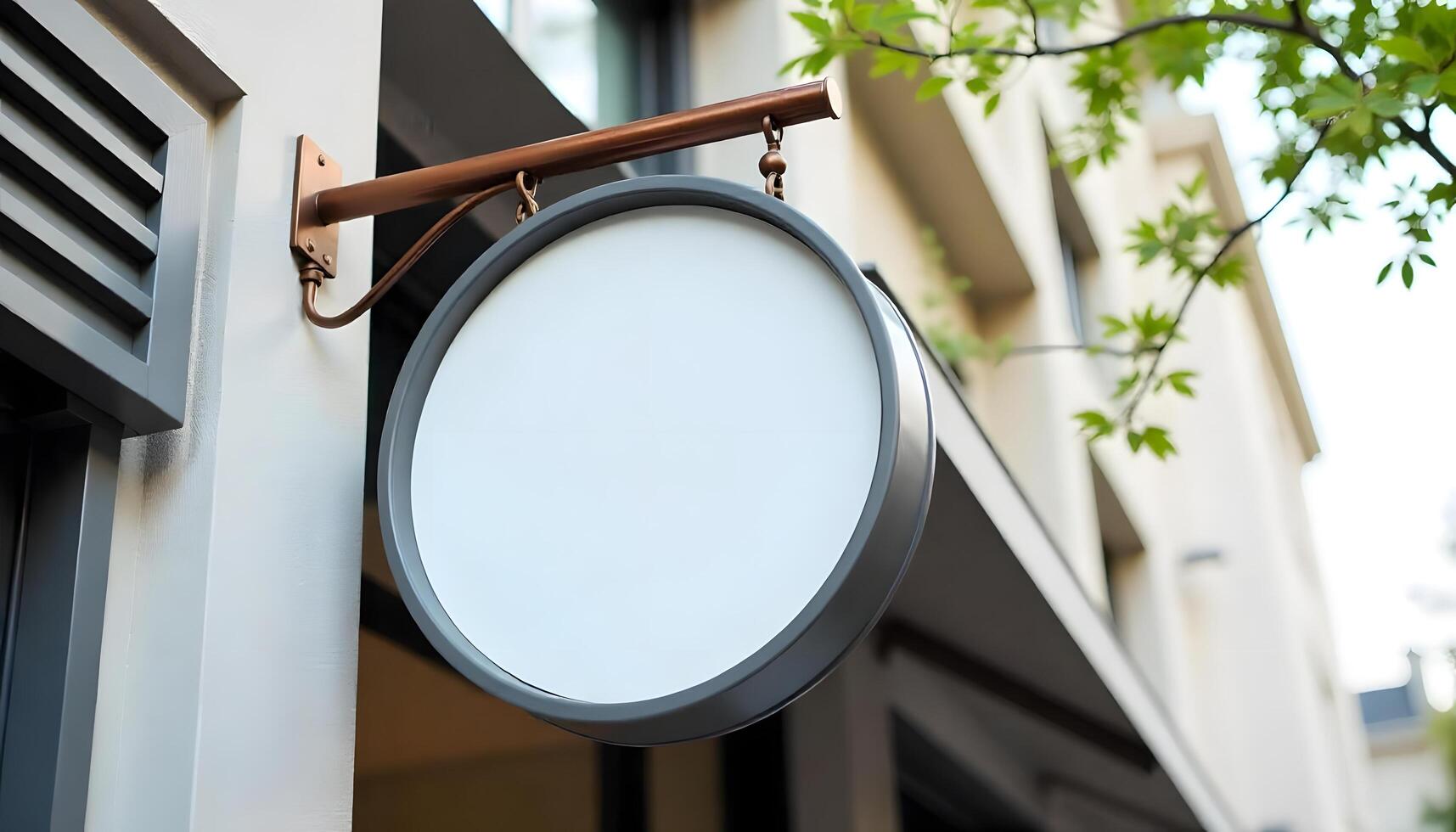 Blank round sign on a store front for your visual brand mockup in a city photo