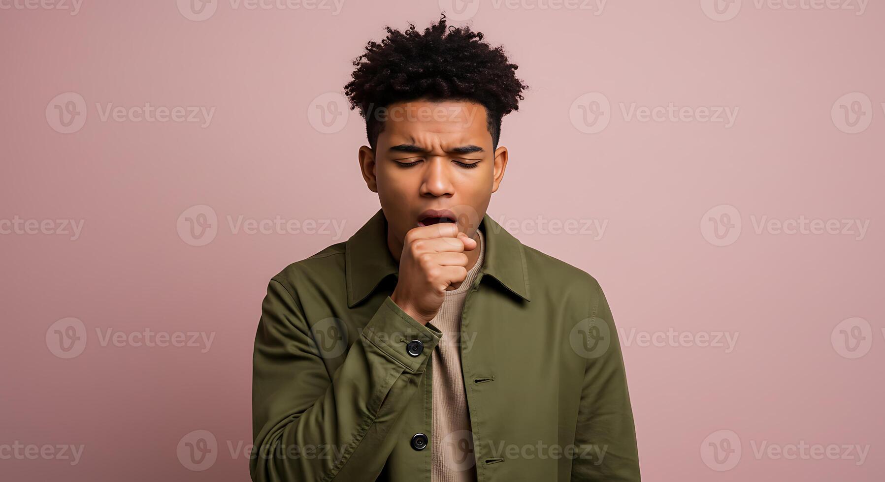 Young Man Coughing A Simple Serious Portrait photo