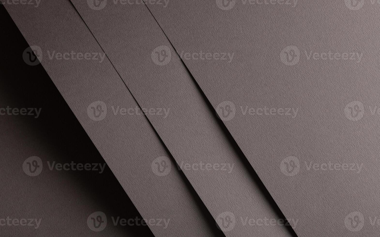Gray paper background with a matte texture and elegant taupe tones. Subtle geometric lines and a photo