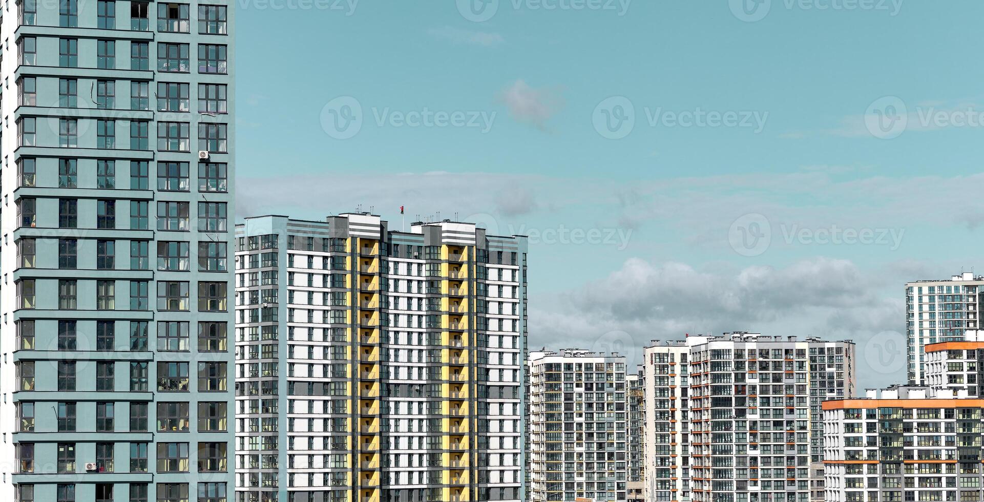 Cityscape skyline with modern high-rise buildings, urban architecture, and residential condos. photo