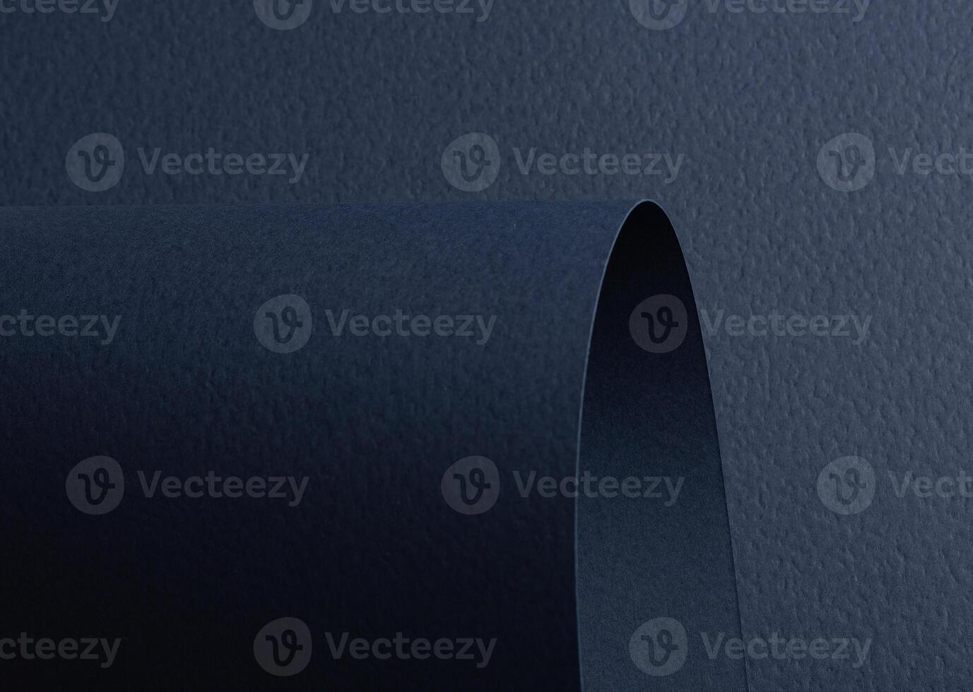 Navy blue paper background with a matte texture and rough grain. Deep, dark tones create an elegant, photo