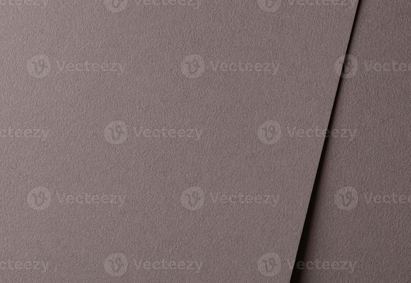 Mocha mousse paper background with a soft matte texture and fine grain. Rich brown tones and photo