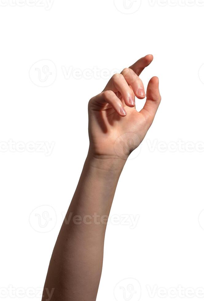 Female hand with slightly curved index finger reaching forward, making a tapping or picking gesture. photo