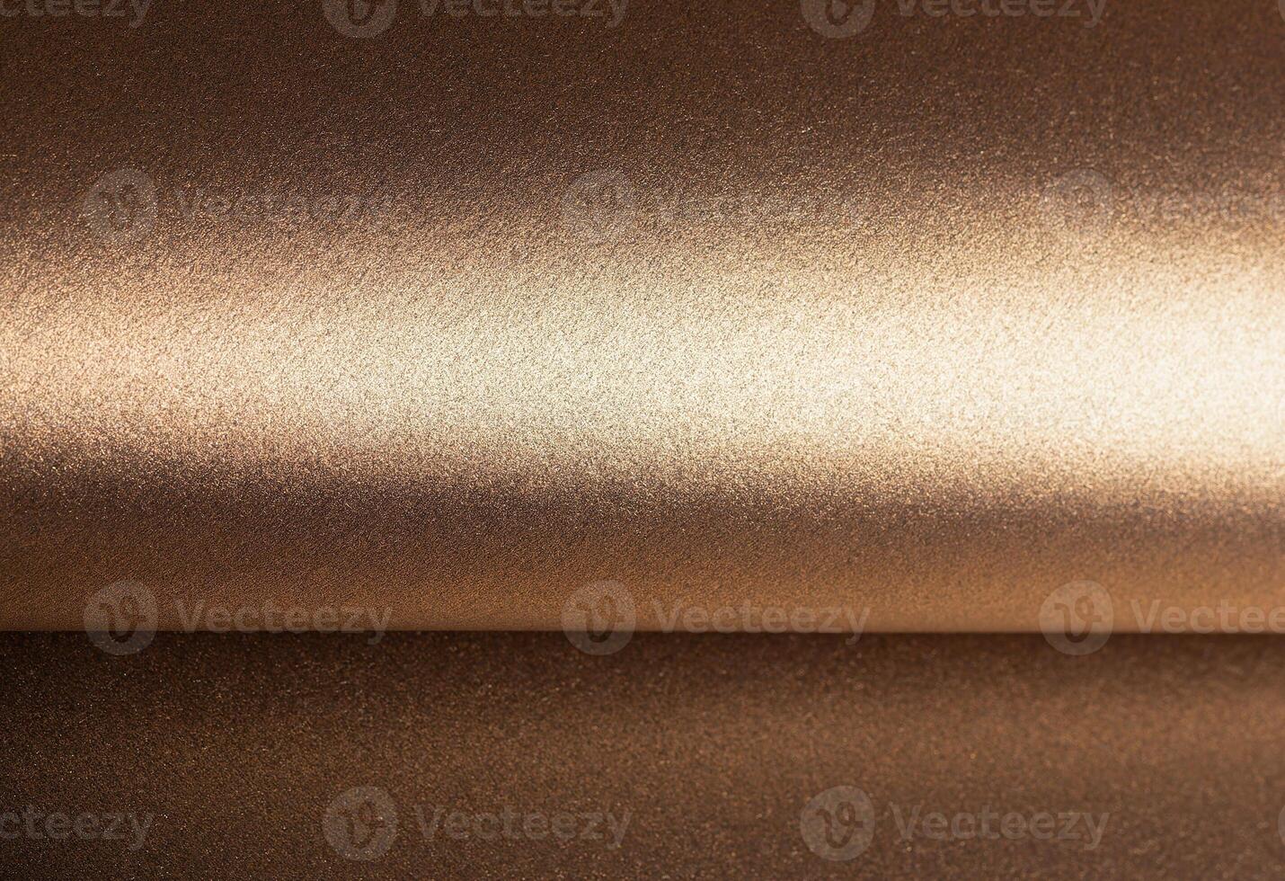 Warm gold and bronze paper background with a pearlescent, metallic texture and shimmering effect. photo