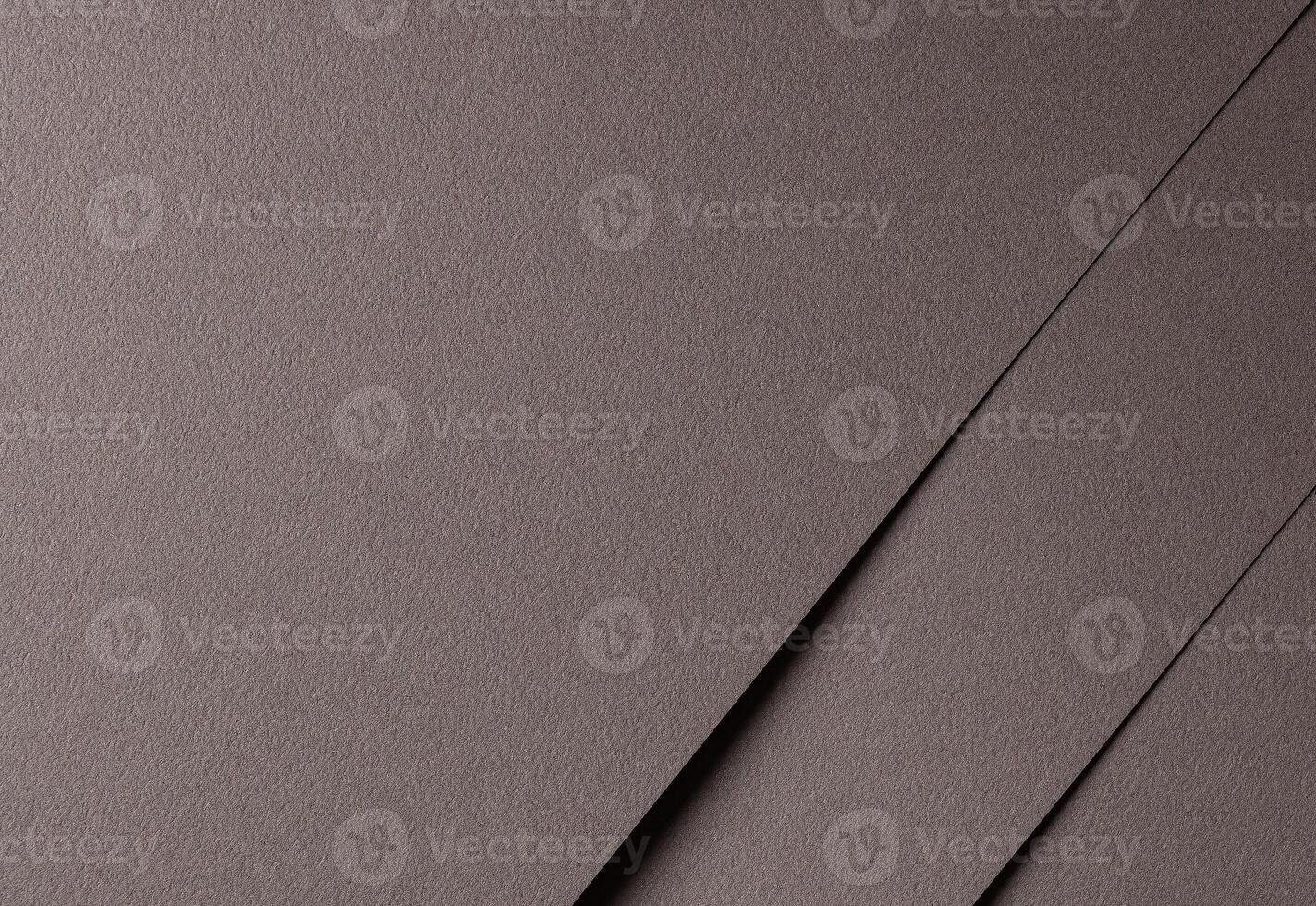 Mocha mousse paper background with a matte, grainy texture and geometric lines. Rich neutral brown photo