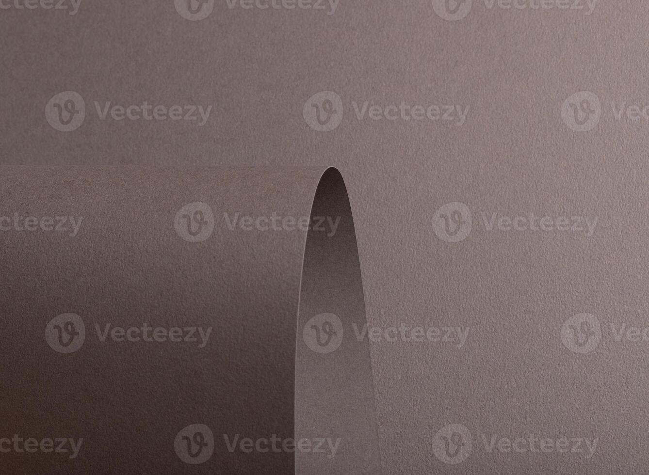 Mocha mousse paper background with a matte, grainy texture and subtle curved, wavy edges. Rich photo