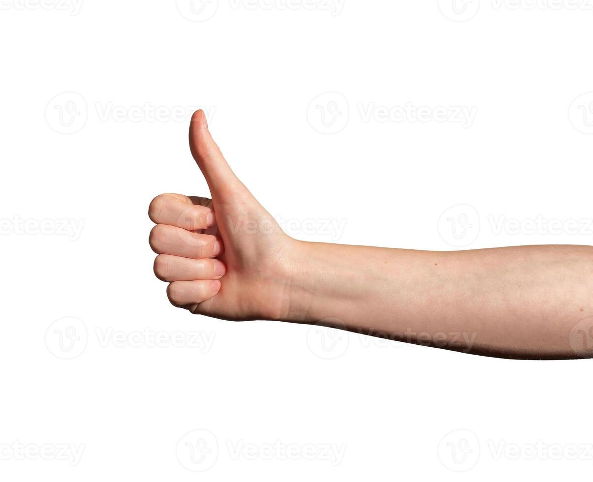 Hand showing thumbs-up gesture. Caucasian female expressing approval, success, and positivity. Light photo