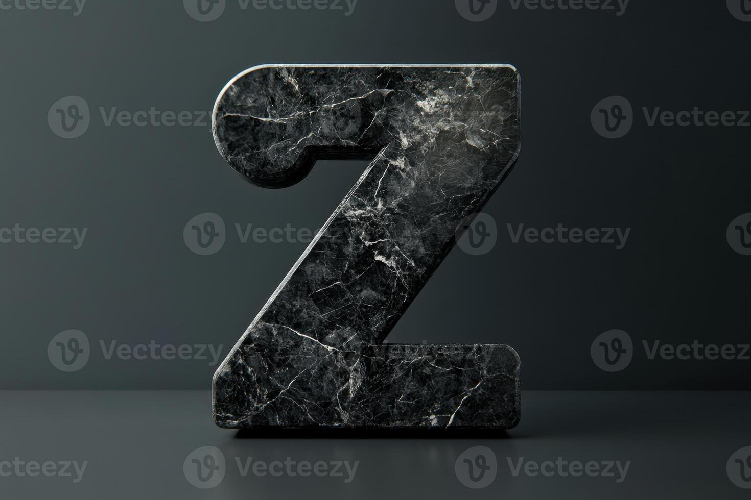 The letter Z is made of marble and is black in color photo