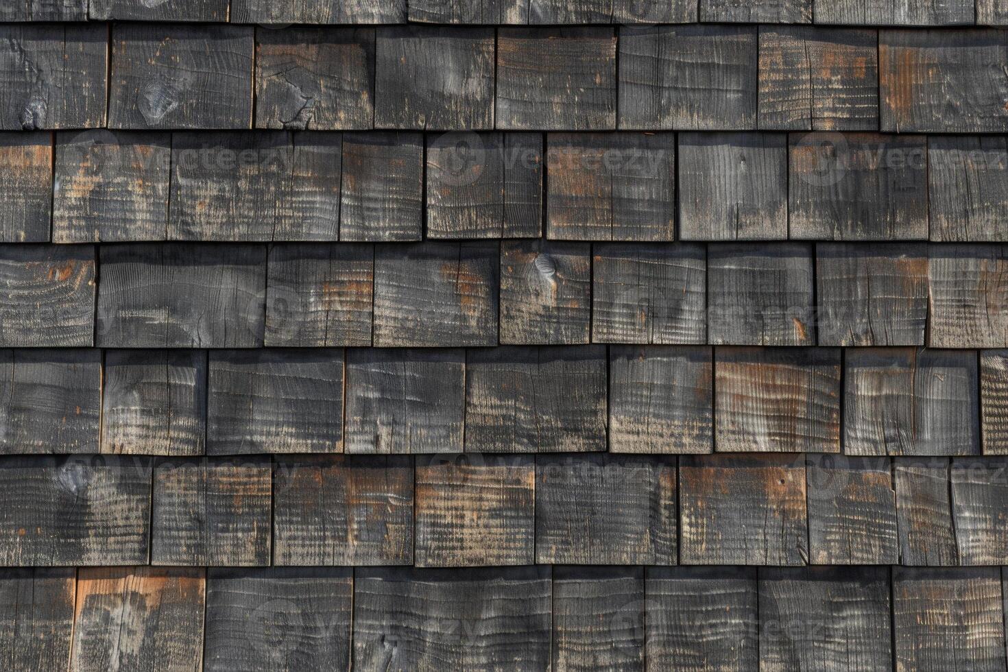 A close up of a wooden shingled roof photo