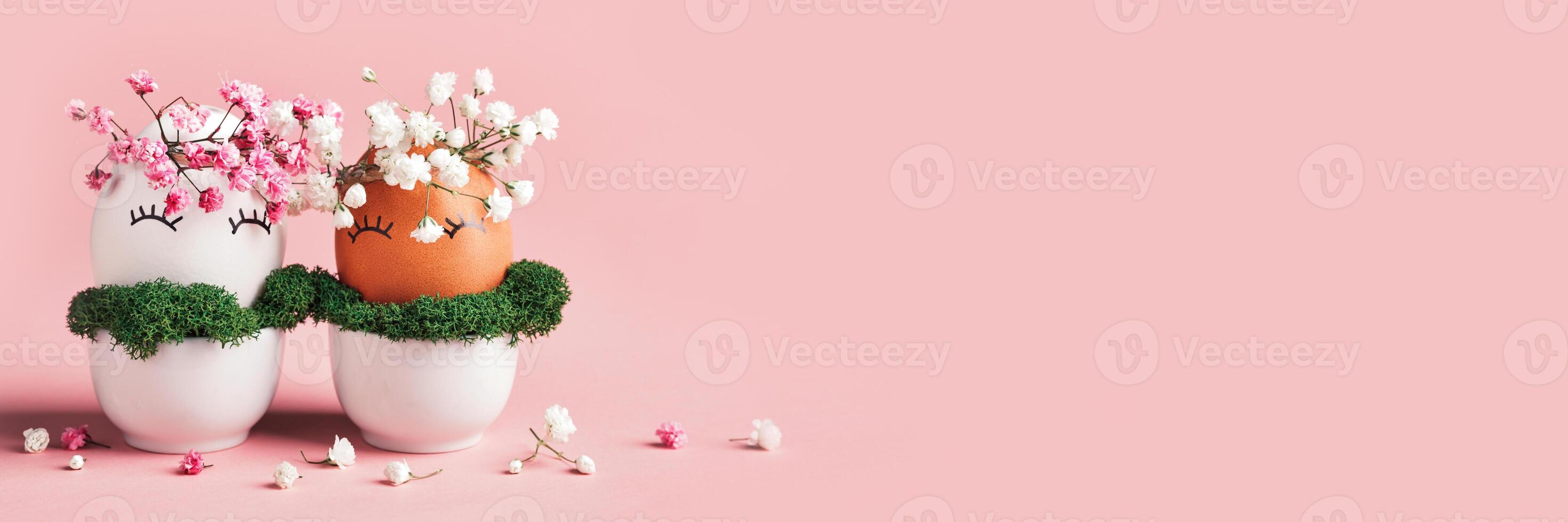 Banner with White and black Easter eggs. Natural flowers decor. Zero Waste Easter Concept. Sunlight and floral shadows photo