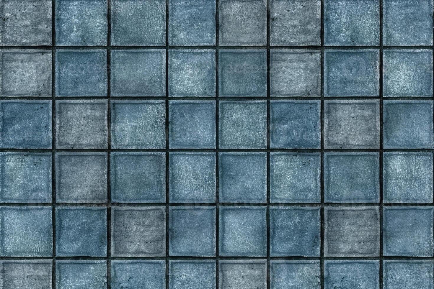 detailed close-up of a wall covered in blue tiles photo