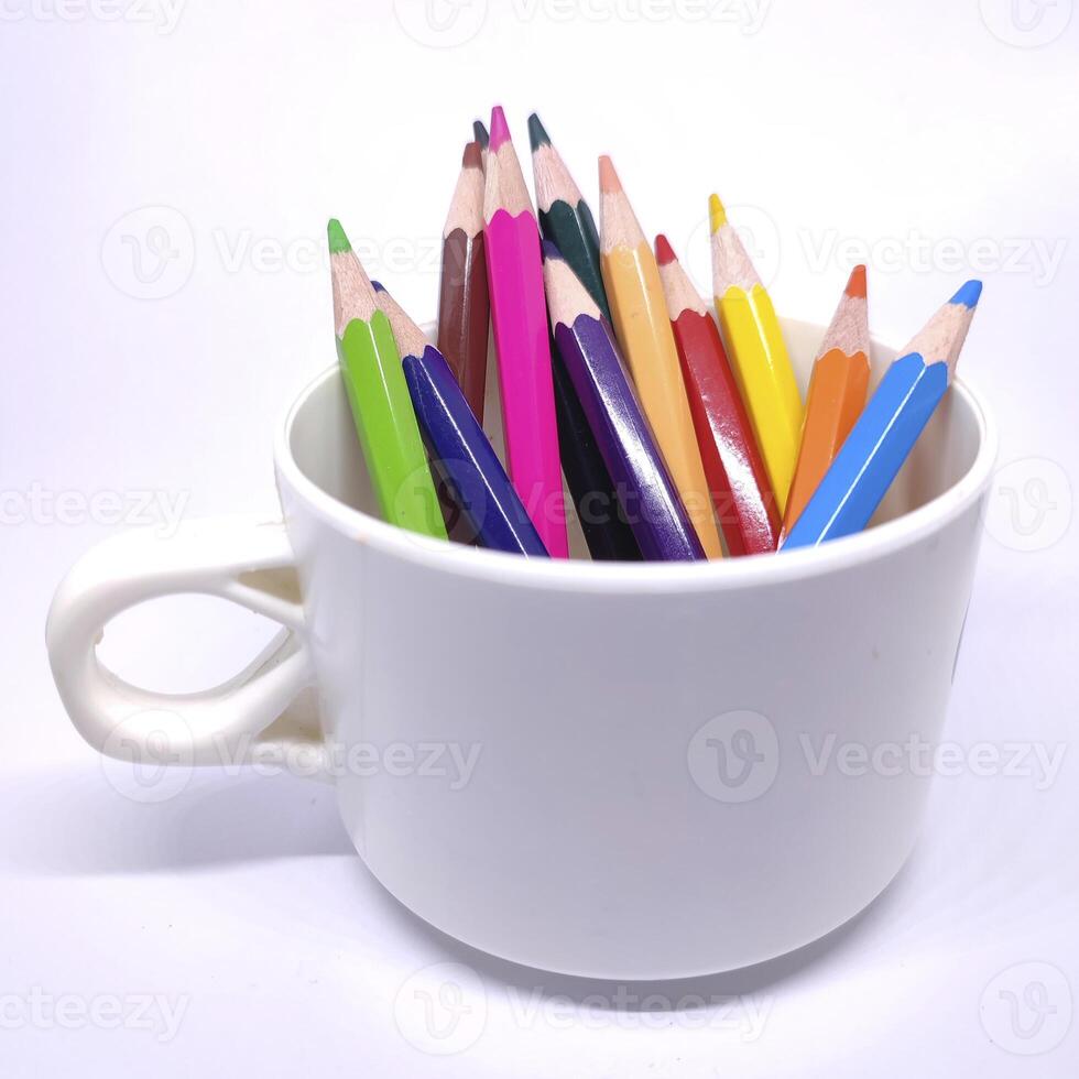 A pencil standing in a white cup, simple and minimalistic, with a clean and classic look. photo