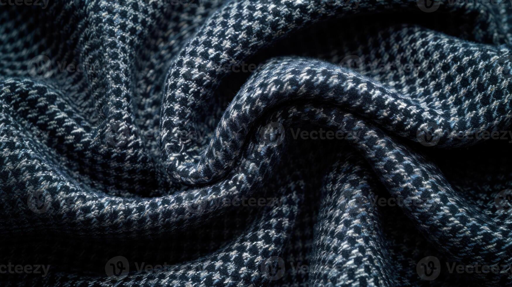 Close-up of dark blue and white textured fabric with a complex pattern. photo