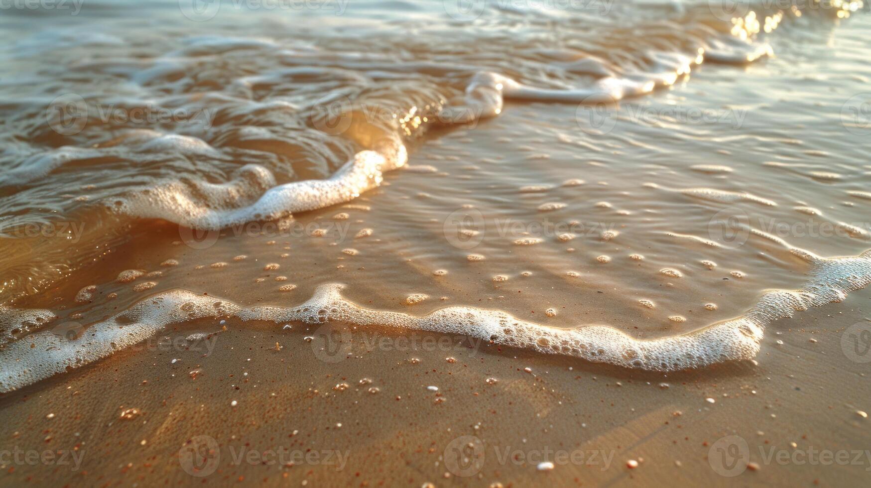Gentle waves lapping at a sandy shore at dawn. photo