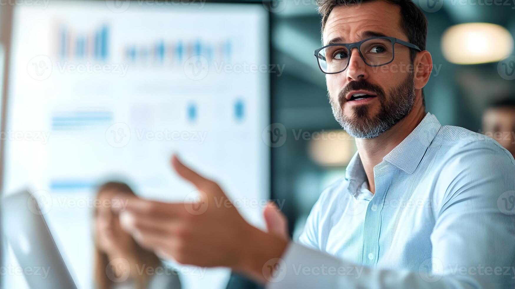 Startup Founder Presenting Business Strategies to Dynamic Team in Modern Office Setting photo