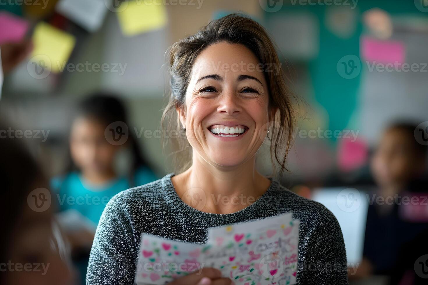 Overjoyed Teacher Surprised with Heartfelt Thank You Notes from Students in Warm Inviting Classroom photo