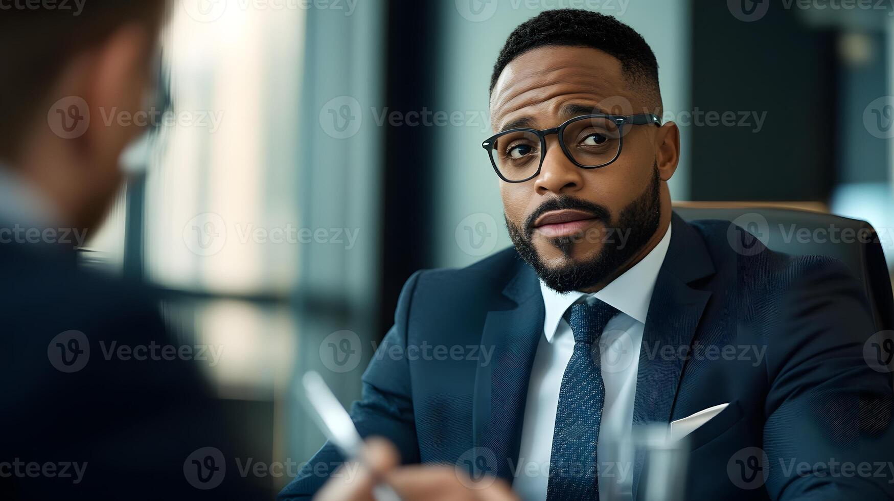 Financial Advisor Explaining Asset Diversification to Client in Elegant Office Setting photo