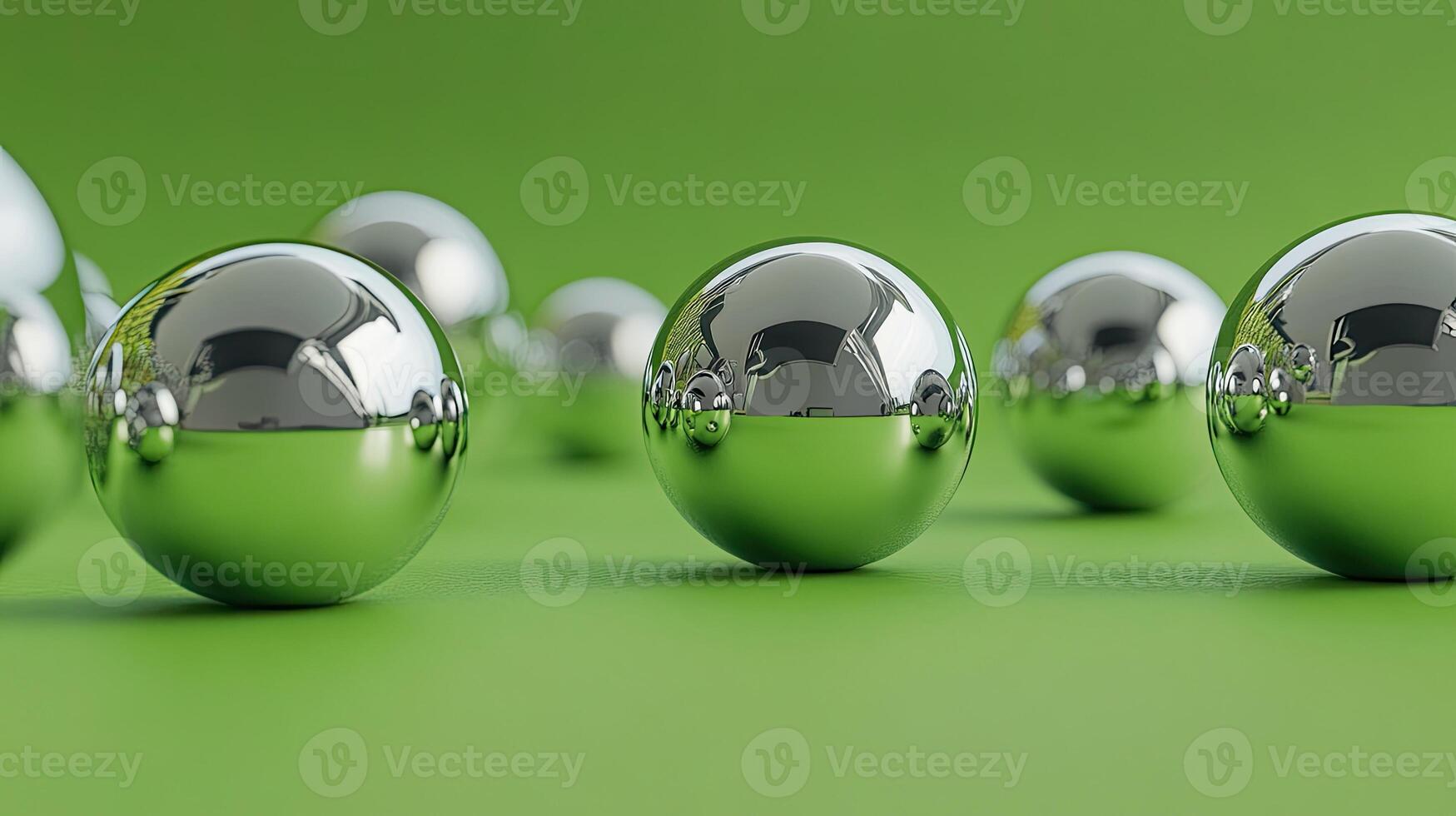 Reflective Metallic Spheres Arranged on Green Background for Futuristic Design Concept photo