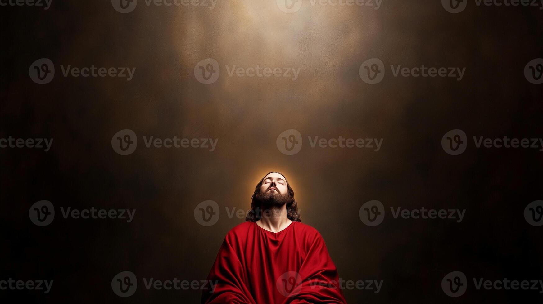 disciple of Jesus christ looking up in prayer into devine light photo